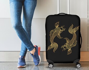May include: Black luggage cover with a gold outline of two koi fish swimming in a circle.