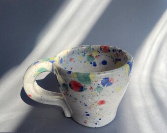 Handmade multi coloured ceramic rainbow mug