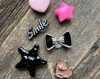 Hearts, stars, flowers, bows and smile croc charms