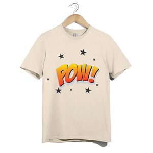 Camiseta unisex de cómic de prisioneros de guerra / Camiseta retro con explosión de arte pop / Camiseta con gráficos de sonido de acción divertidos / Camiseta estilo cómic atrevido / Camiseta con la palabra "POW"
