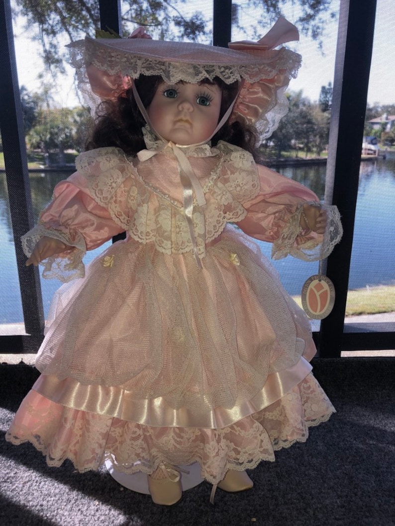Beautiful porcelain doll made by DELTON products Etsy
