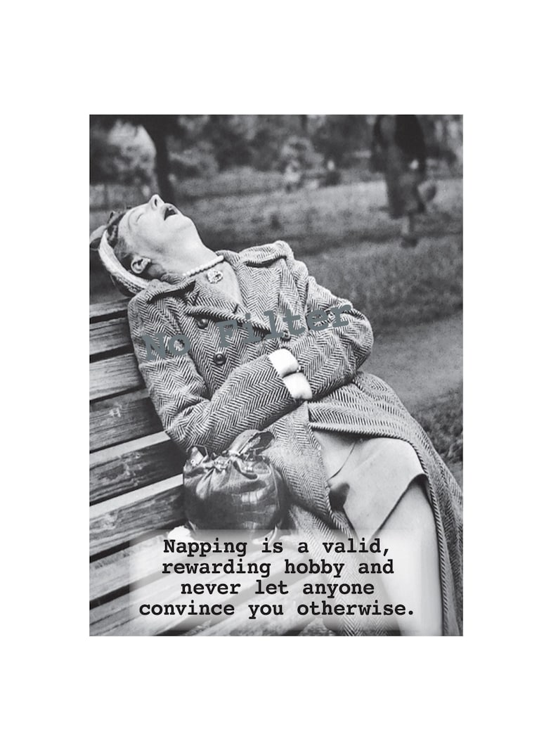 May include: Black and white image of a person napping on a park bench. The person is wearing a tweed coat and a hat. The image includes the text: "Napping is a valid, rewarding hobby and never let anyone convince you otherwise."