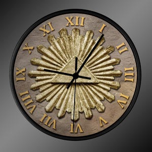 May include: Round wall clock with a black frame, featuring a gold-colored sunburst design and Roman numerals. The clock face has a textured, brown background with a triangle in the center.