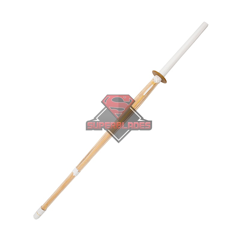 May include: A white and brown wooden practice sword with a white handle and a white tip. The sword is approximately 1.2 metres long.