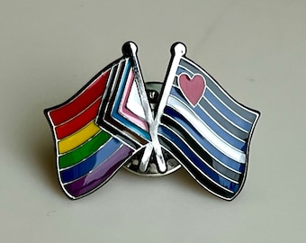 The LGBTQ + POC Progress Pride and Leather / Kink Double Flag Pin Badge