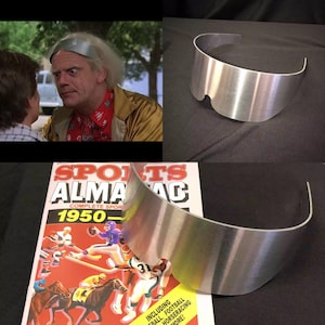 Doc brown all metal sunglasses + alamanac back to the future 2