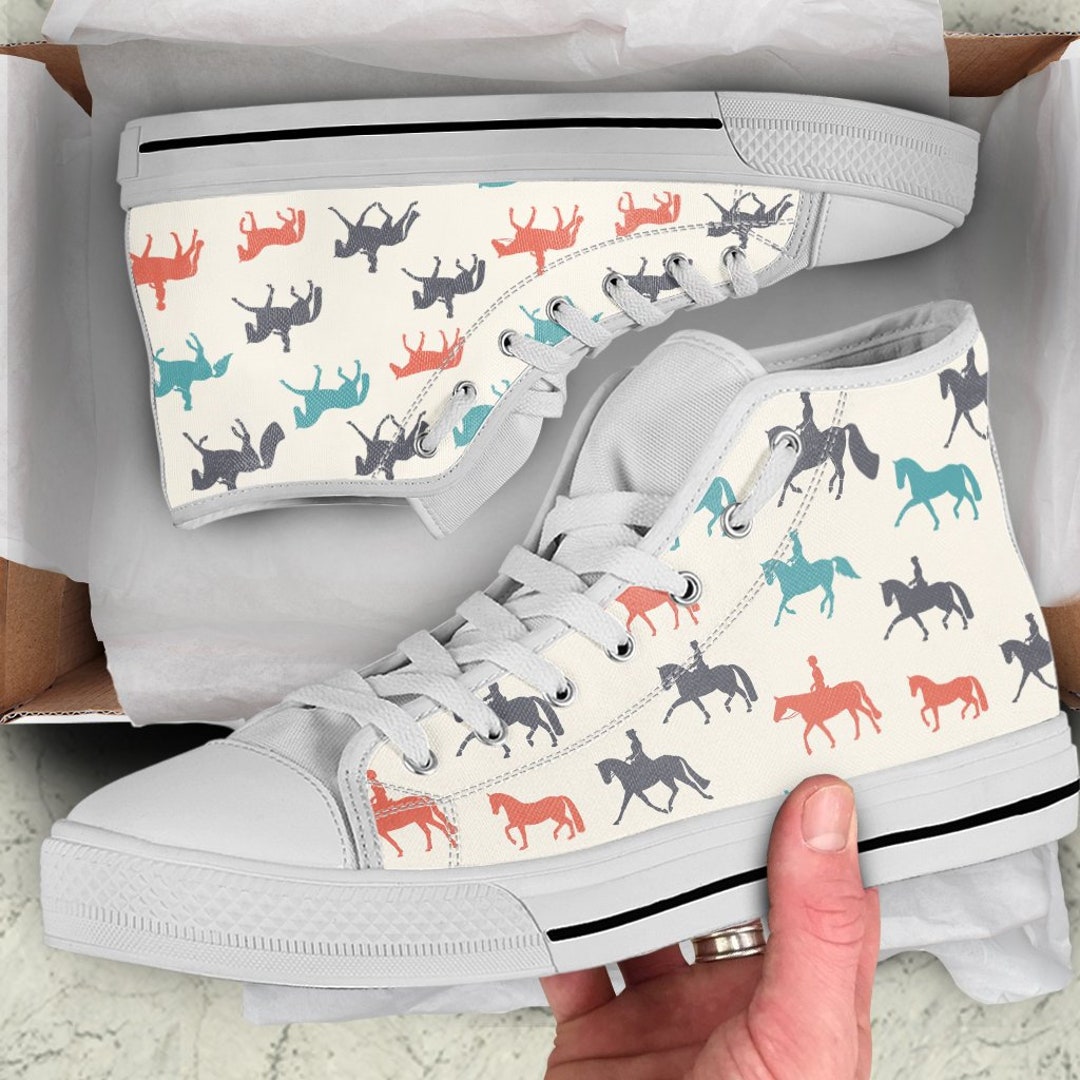 Sneakers with shop horses on them