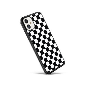 May include: Black and white chequered phone case for an iPhone.