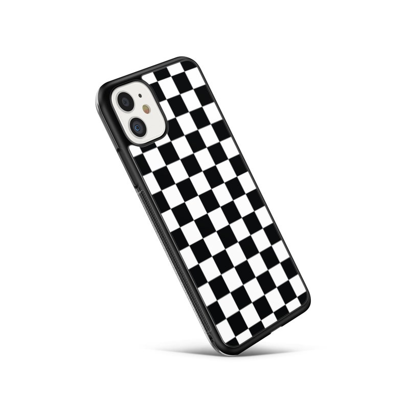 May include: Black and white chequered phone case for an iPhone.