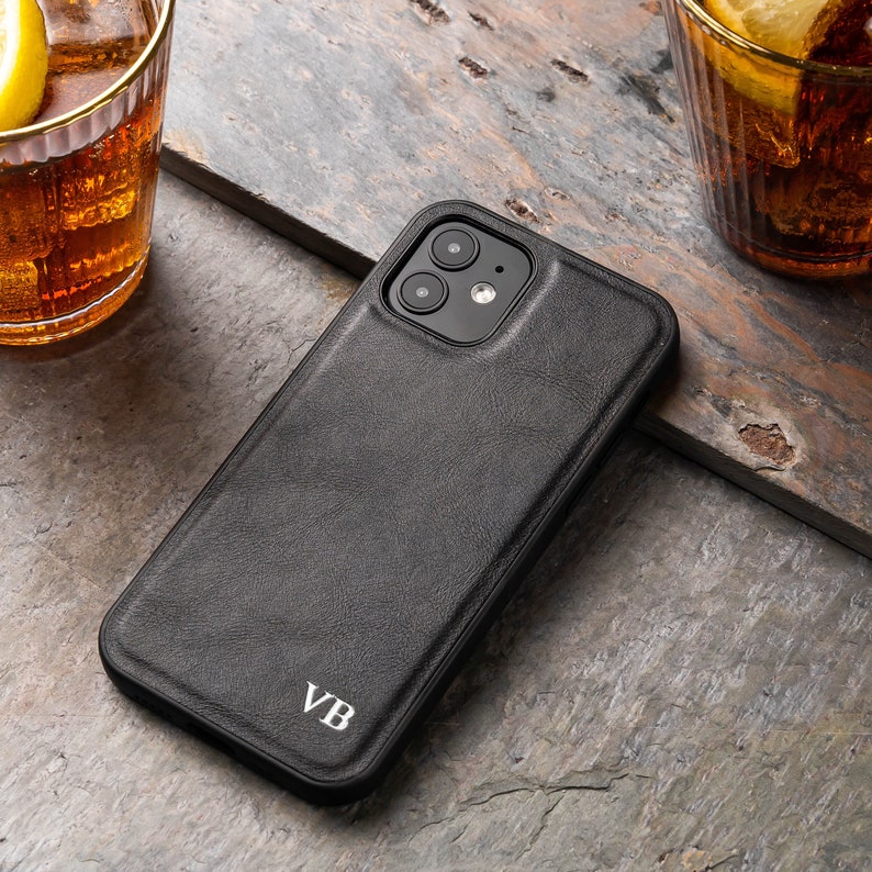 Black PU leather phone case available in all iPhone models with the option to personalise with your choice of initials.