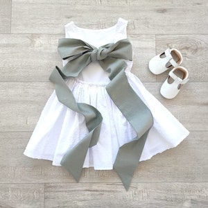 Girl&#39;s bridesmaid dresses,  White flower girl dresses with sash, Plumetti white dress, Dress with bows