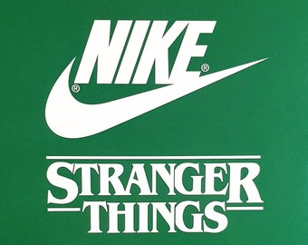 Hand painted of Nike Cortez x Hawkins High Strangers things  lights and upside down painted on special edition Nike kicks