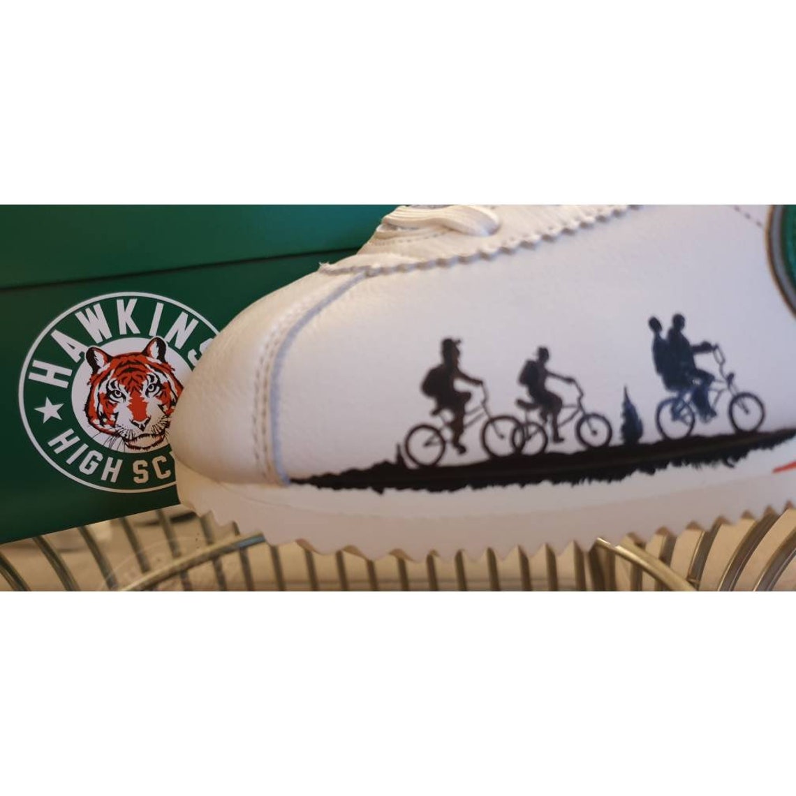 nike cortez hawkins high