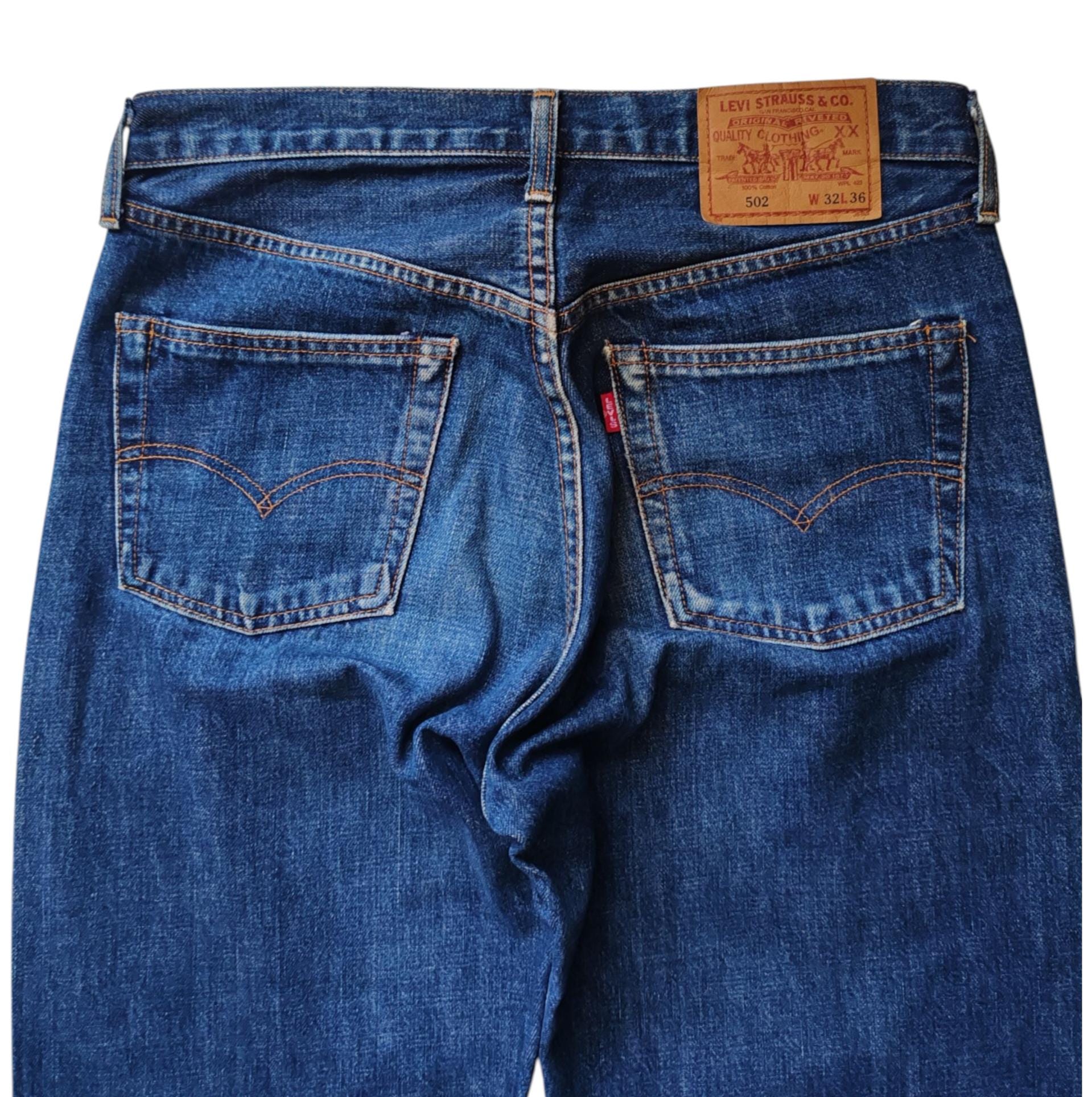 Vintage 90s Levi's 502XX Jeans Size 30 in Waist / Faded Distressed