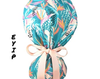 Ponytail Scrub Cap for Women by EYIP, Bird of Paradise Flowers Surgical Cap, Pink Ribbon & Clear Buttons
