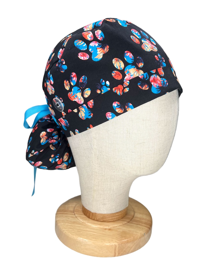 Ponytail Scrub Cap for Women by EYIP, Dog Paws Surgical Cap, Blue Ribbon & Clear Buttons image 2