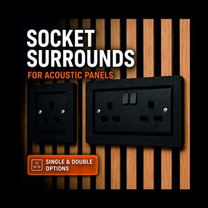 May include: Black socket surrounds for acoustic panels. The image shows a single and a double outlet, both with a textured black frame. The text on the image reads "SOCKET SURROUNDS FOR ACOUSTIC PANELS" and "SINGLE & DOUBLE OPTIONS". The background is wooden slats.