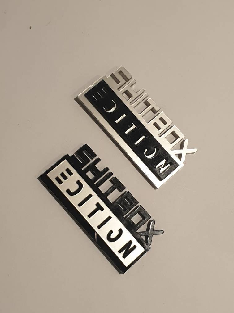 2x Silver & Black Metal Shitbox Edition Car Emblem Chrome Sport Logo