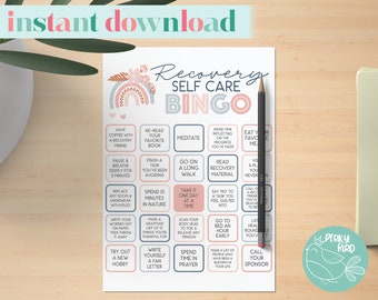 May include: A printable bingo card with a pink and blue rainbow design. The card features self-care activities for recovery, such as meditating, reading recovery material, and spending time in prayer. The card also includes the text "Recovery Self Care Bingo".
