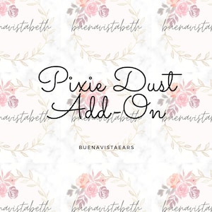 Puede incluir: Un fondo blanco con un patrón floral y el texto "Pixie Dust Add-On" en fuente cursiva negra. El texto "BUENAVISTAEARS" también está en fuente negra debajo del texto cursivo.