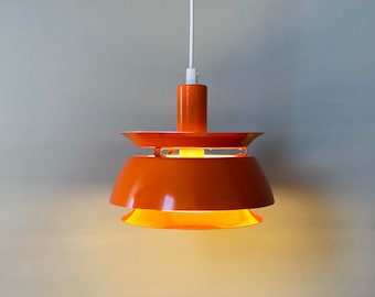 Danish Vitrika pendant light. Original orange color.  Vintage ceiling lamp