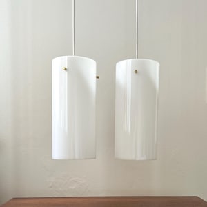 Fog Moerup pendant lights. White minimalist design.