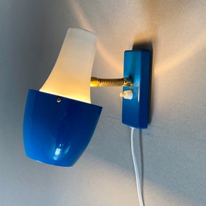Danish Mid-century vintage wall lamp.  Designed by Lyskaer Belysning