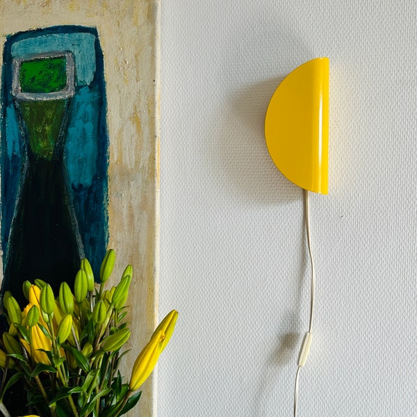 Danish minimalist vintage sconce. Yellow metal wall lamps