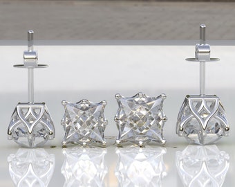 May include: A pair of silver earrings featuring clear square-shaped cubic zirconia stones. The earrings have a delicate, intricate design around the stones.