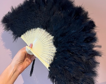 Vintage black feather fan.