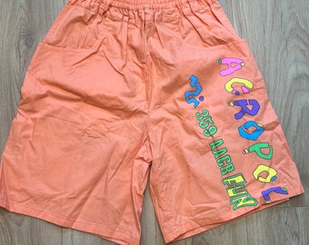 Vintage 1980's bemuda shorts, fluoro shorts, 80's swimming shirts, festival shorts. UK