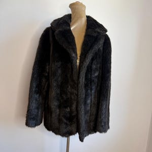 Vintage jaren 70 zwarte imitatiebontjas: Britse maat 10-12