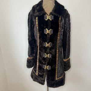 Vintage 1970&#39;s dark brown faux fur coat with gold clasps. UK 10