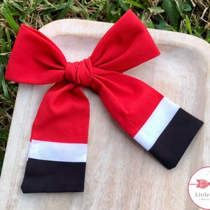 Santa themed hand tied bow