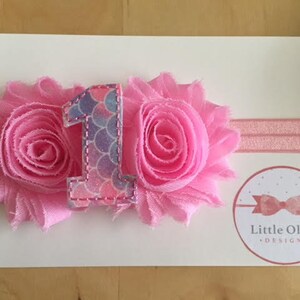 rosa Blüten mit Meerjungfrau Maßstab Nummer 1 und Rosa Stirnband