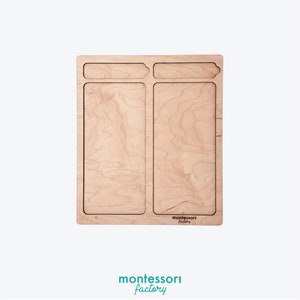 May include: A wooden tray with two rectangular compartments and a small rectangular compartment at the top. The tray is made of light wood and has a "montessori factory" logo in the bottom right corner.