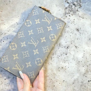 lv knot off wallet