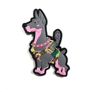 May include: A gray dog-shaped patch with pink accents, a pink collar, and a brown harness. The dog has a stern expression and is carrying a weapon. The patch has a black border.
