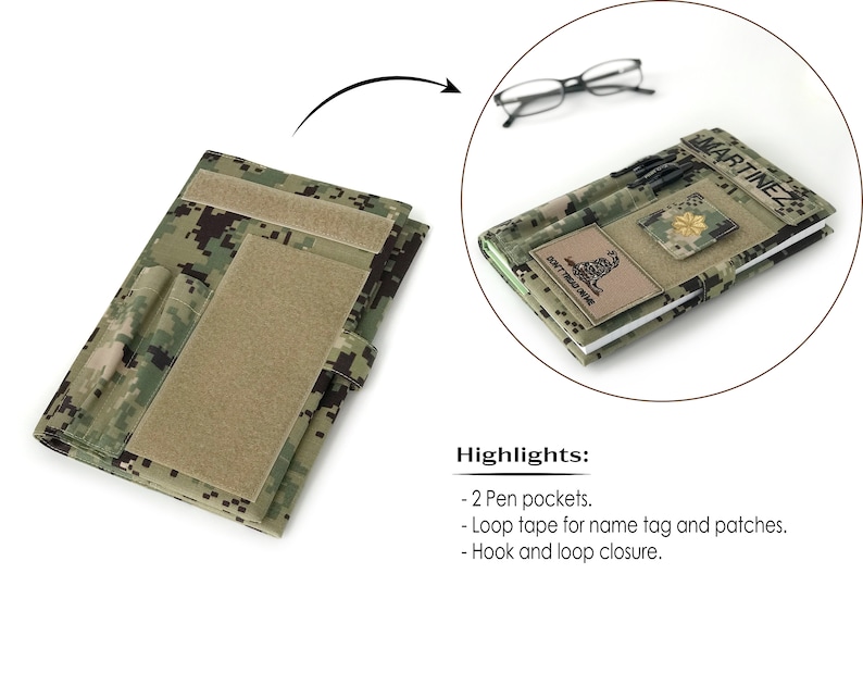 May include: A camouflage-patterned notebook cover with a hook and loop closure. Features two pen pockets and loop tape for name tags and patches. The cover is open, revealing a notebook with a name tag that reads "MARTINEZ" and a patch that reads "DON'T TREAD ON ME".