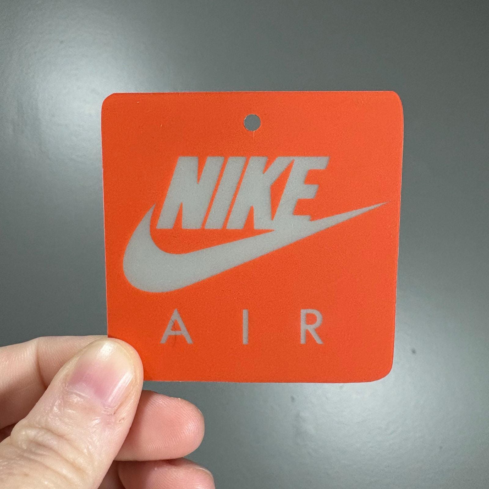 jordan 4 orange tag