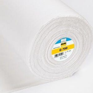 May include: A roll of white fabric with a label that reads "G 700". The fabric is tightly wound, showing the layers of material. The label has blue, yellow, and black accents. The roll is approximately 23 inches wide.