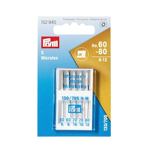 Puede incluir: Un paquete de agujas para máquina de coser Prym Microtex. El embalaje es blanco y azul con el logotipo de Prym y la información del producto. Las agujas están marcadas 60-80, tamaños 8-12, para microtextiles.
