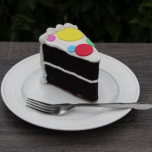 Slice of Fake Polka Dot Frosted Cake
