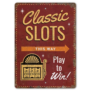May include: A red and gold vintage-style sign with the text "Classic Slots" and an arrow pointing right with the text "This Way". Below the arrow is a stylized image of a slot machine with cherries and the text "Play to Win!"