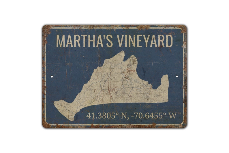 a metal sign with a map of martha's vineyard