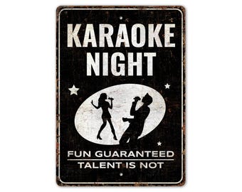 May include: A rectangular metal sign with a distressed black background and white text that reads "KARAOKE NIGHT". The sign features silhouettes of a man and woman singing, with the text "FUN GUARANTEED TALENT IS NOT".