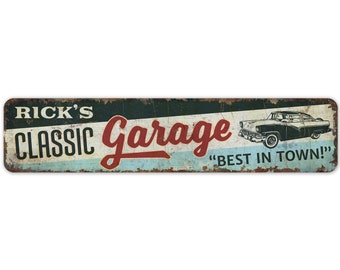 May include: A vintage-style metal sign with a distressed look. It reads "Rick's Classic Garage" in red and white lettering with a black and white illustration of a classic car. The sign also says "Best in Town!" in red lettering.