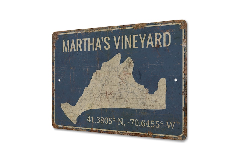 a metal sign with a map of martha's vineyard