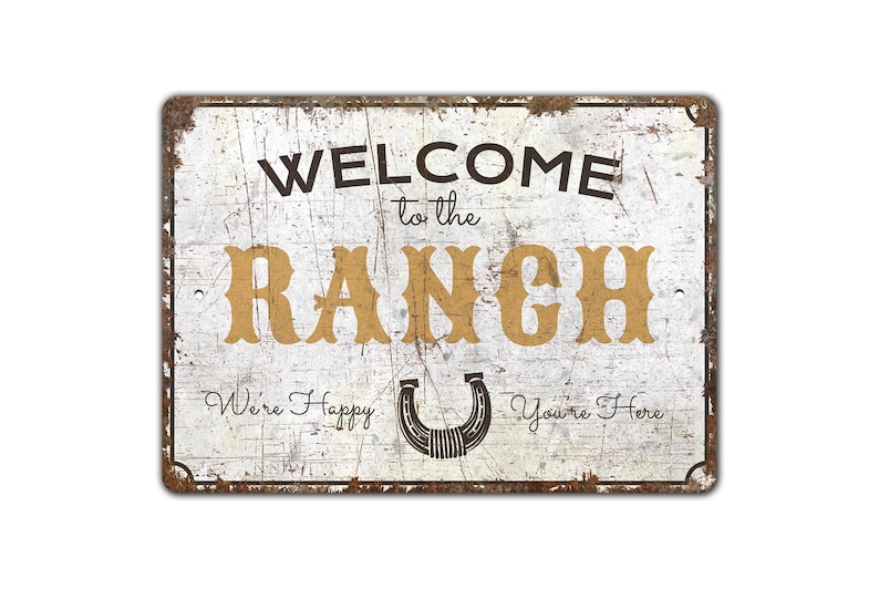 a metal sign that says welcome to the ranch