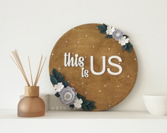 This Is Us round wood sign with flowers - This is us tv show fans gift - Farmhouse wall decor - Family name sign - Parents anniversary gift